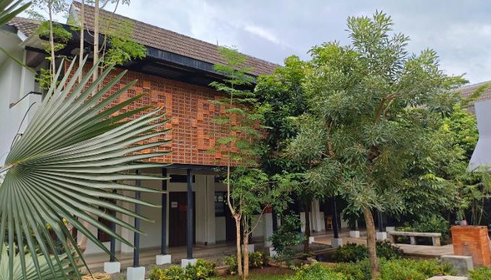 An inclusive Pesantren Tahfiz Difabel building designed for students with disabilities, featuring universal design principles such as accessible ramps, guiding blocks, and disability-friendly facilities.