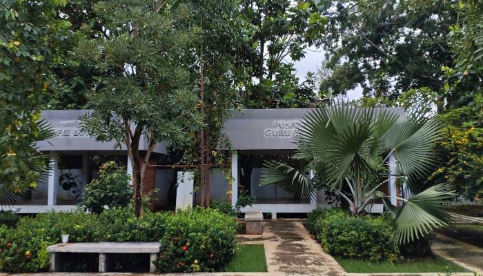 An inclusive Pesantren Tahfiz Difabel building designed for students with disabilities, featuring universal design principles such as accessible ramps, guiding blocks, and disability-friendly facilities.