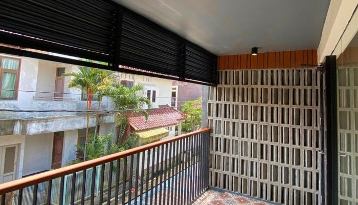 Exterior and interior views of CR House, a modern residential project in South Jakarta designed by YPA Architects, featuring an open layout, natural lighting, and contemporary materials.