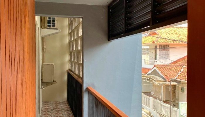 Exterior and interior views of CR House, a modern residential project in South Jakarta designed by YPA Architects, featuring an open layout, natural lighting, and contemporary materials.