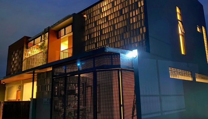 Exterior and interior views of CR House, a modern residential project in South Jakarta designed by YPA Architects, featuring an open layout, natural lighting, and contemporary materials.