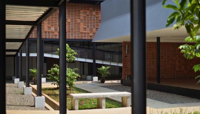 An inclusive Pesantren Tahfiz Difabel building designed for students with disabilities, featuring universal design principles such as accessible ramps, guiding blocks, and disability-friendly facilities.