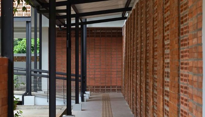 An inclusive Pesantren Tahfiz Difabel building designed for students with disabilities, featuring universal design principles such as accessible ramps, guiding blocks, and disability-friendly facilities.