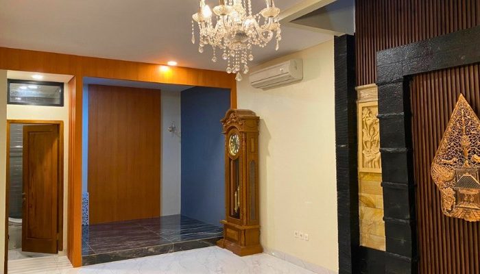 Exterior and interior views of CR House, a modern residential project in South Jakarta designed by YPA Architects, featuring an open layout, natural lighting, and contemporary materials.