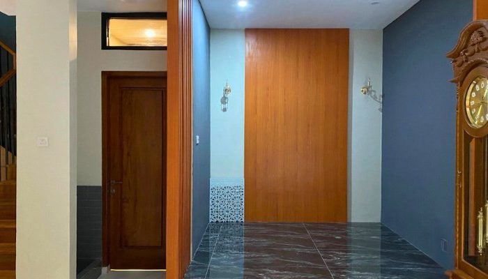 Exterior and interior views of CR House, a modern residential project in South Jakarta designed by YPA Architects, featuring an open layout, natural lighting, and contemporary materials.