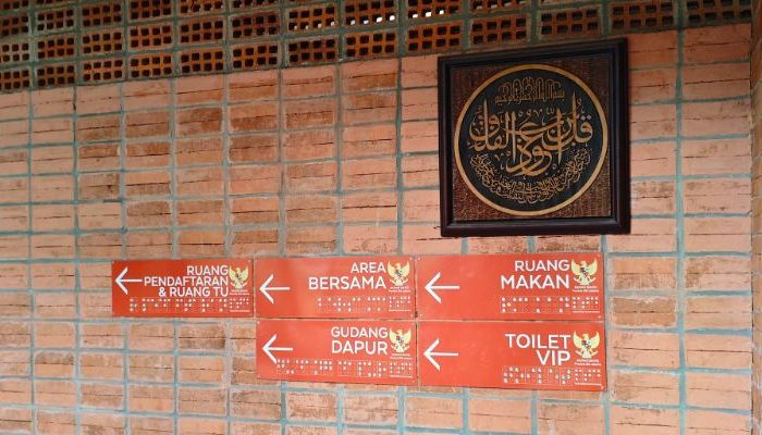 An inclusive Pesantren Tahfiz Difabel building designed for students with disabilities, featuring universal design principles such as accessible ramps, guiding blocks, and disability-friendly facilities.