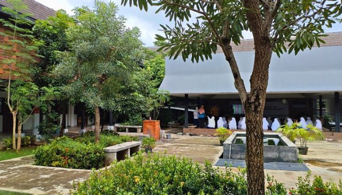 An inclusive Pesantren Tahfiz Difabel building designed for students with disabilities, featuring universal design principles such as accessible ramps, guiding blocks, and disability-friendly facilities.