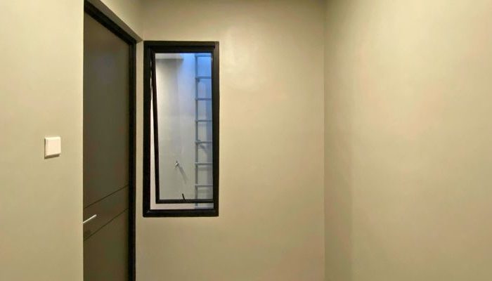 Modern contemporary house with clean lines, neutral tones, and efficient massing on a compact site in Cileungsi, Bogor – JPN House by YPA Architecture