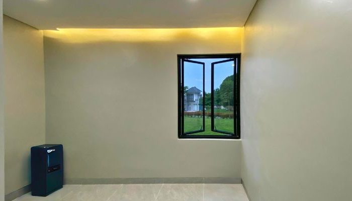 Modern contemporary house with clean lines, neutral tones, and efficient massing on a compact site in Cileungsi, Bogor – JPN House by YPA Architecture