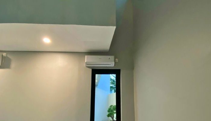 Modern contemporary house with clean lines, neutral tones, and efficient massing on a compact site in Cileungsi, Bogor – JPN House by YPA Architecture