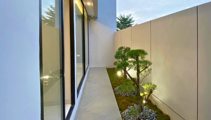 Modern contemporary house with clean lines, neutral tones, and efficient massing on a compact site in Cileungsi, Bogor – JPN House by YPA Architecture