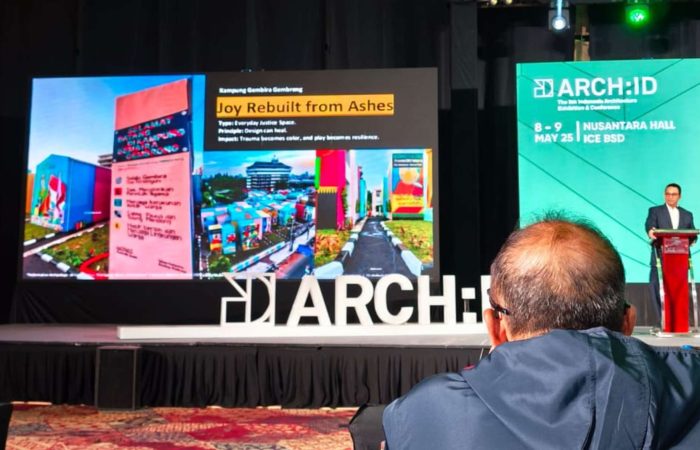 Anies Baswedan presenting Kampung Gembira Gembrong project on stage at Arch:ID 2025.