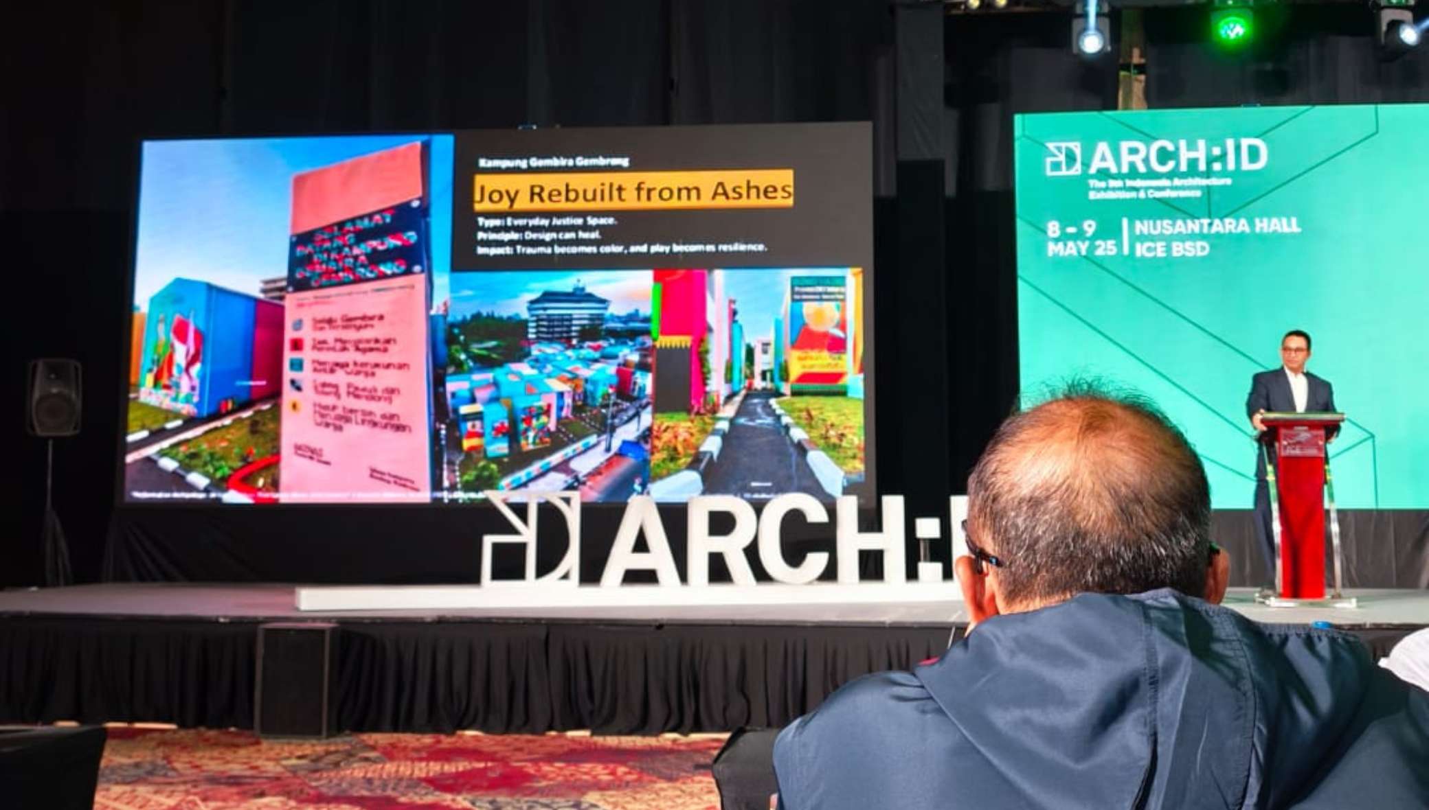 Anies Baswedan presenting Kampung Gembira Gembrong project on stage at Arch:ID 2025.