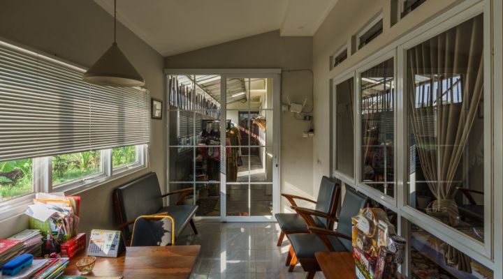 Modern residential and industrial buildings in Purbalingga featuring traditional red brick gates and tropical industrial design by YPA Architecture Studio in 2024.