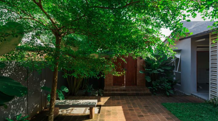 Modern residential and industrial buildings in Purbalingga featuring traditional red brick gates and tropical industrial design by YPA Architecture Studio in 2024.