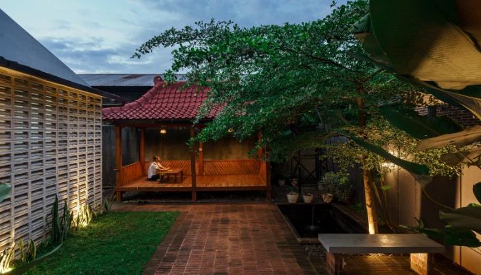 Modern residential and industrial buildings in Purbalingga featuring traditional red brick gates and tropical industrial design by YPA Architecture Studio in 2024.