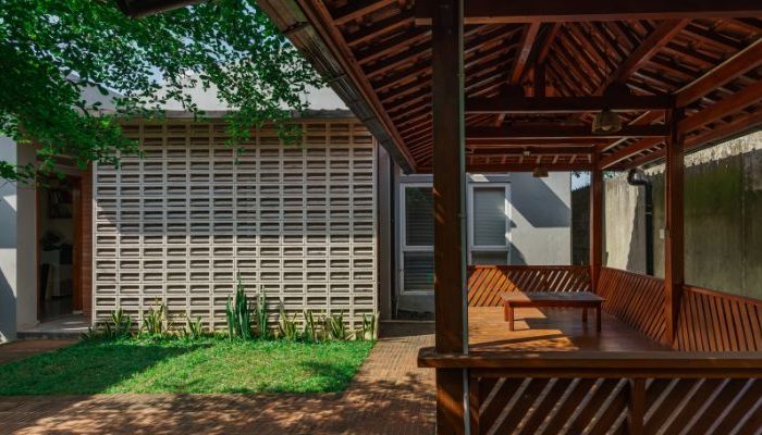 Modern residential and industrial buildings in Purbalingga featuring traditional red brick gates and tropical industrial design by YPA Architecture Studio in 2024.