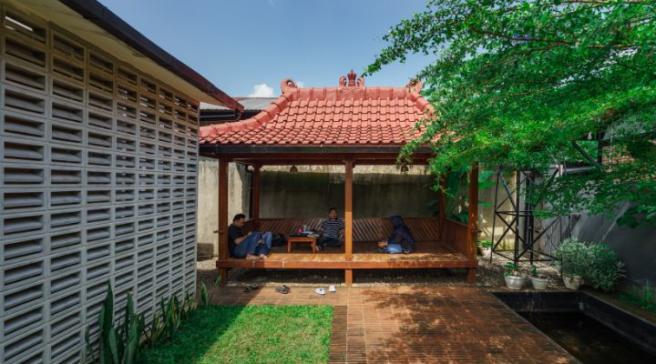 Modern residential and industrial buildings in Purbalingga featuring traditional red brick gates and tropical industrial design by YPA Architecture Studio in 2024.