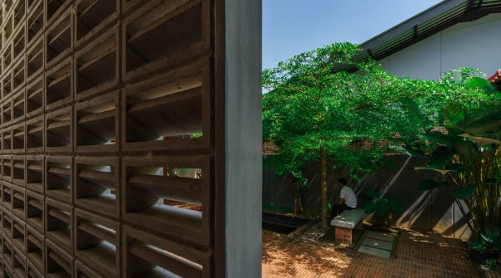 Modern residential and industrial buildings in Purbalingga featuring traditional red brick gates and tropical industrial design by YPA Architecture Studio in 2024.