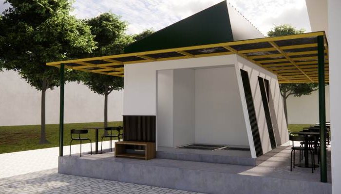 The exterior and interior design of Cafe Difabis RSUD Kebayoran Lama by YPA Architecture Studio features a small building with a transparent canopy, open seating area, and inclusive layout that is disability friendly.