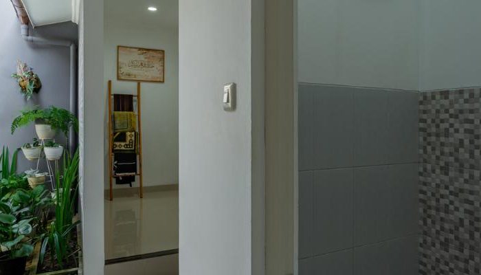 TW House Purbalingga dengan konsep open space yang menghubungkan ruang tamu, ruang bersantai, ruang makan, dapur, inner court, serta area servis dan mushola